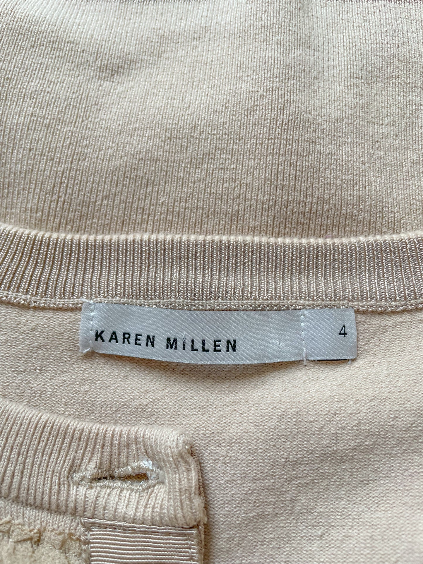 Cárdigan con ribete de seda con volantes de Karen Millen
